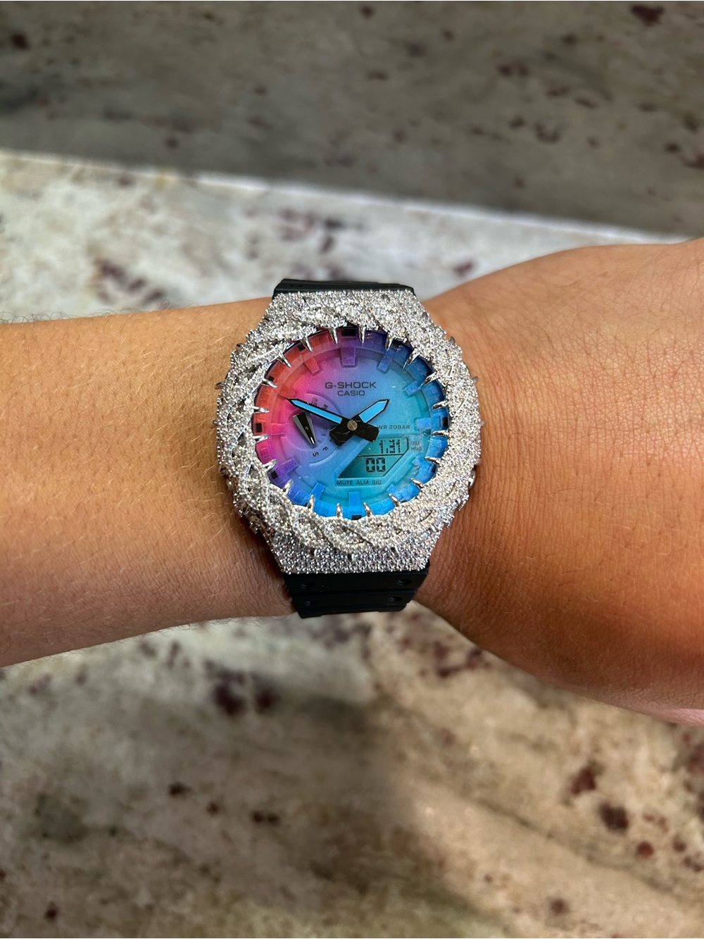 G-Shock Rainbow Gradient Dial Watch with Silver Sparkle Bezel and Black Strap
